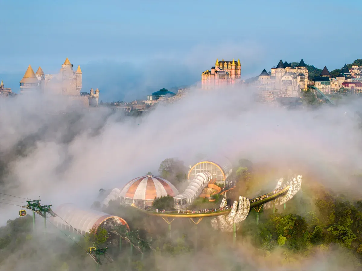 The Golden Bridge at Ba Na Hills above morning cloud on a 9-Day Vietnam Tour